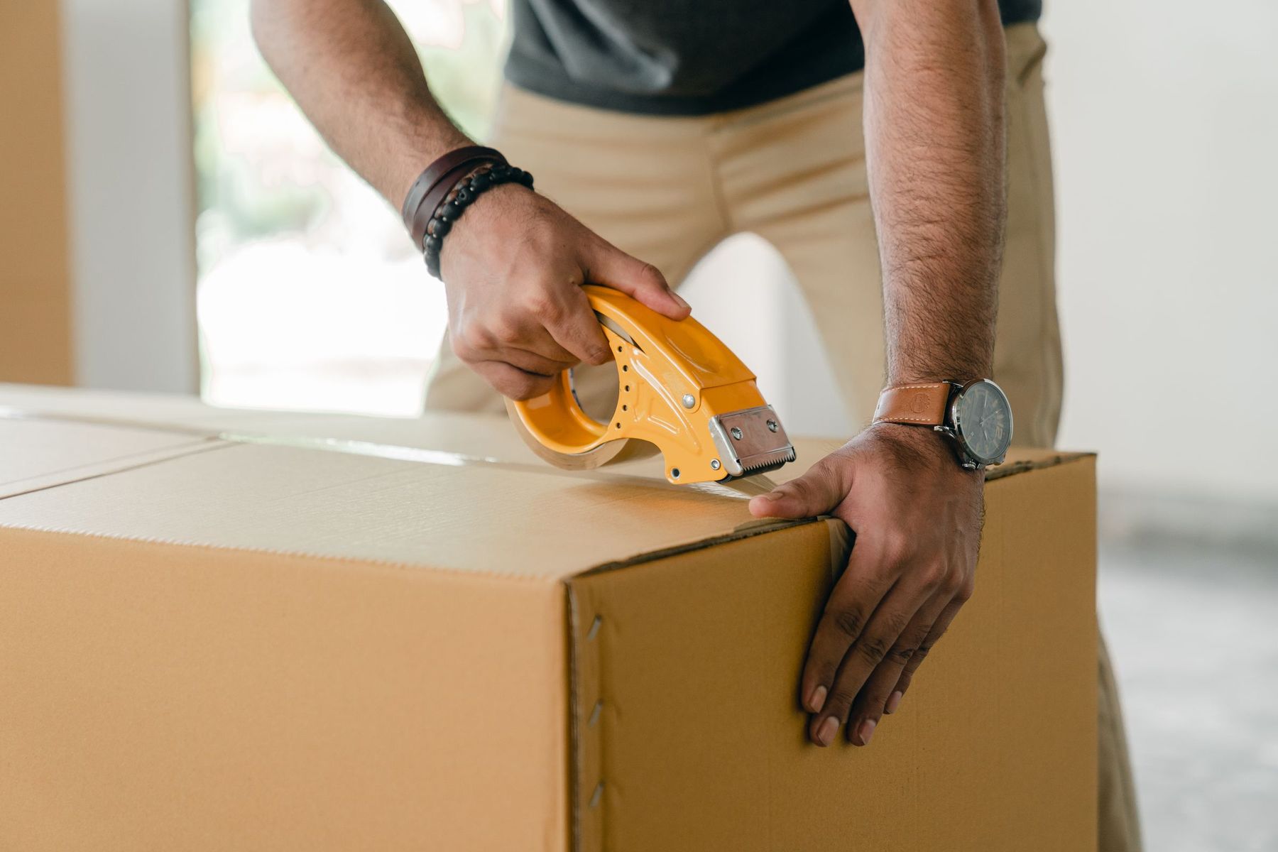 Sealing a carton for commercial shipment